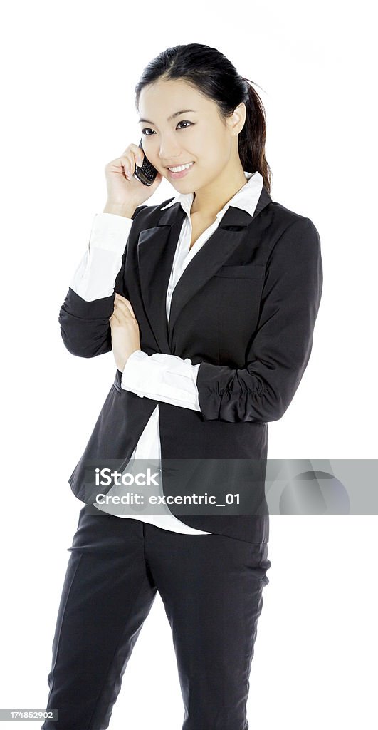 Attraente donna d'affari asiatici isolato su sfondo bianco - Foto stock royalty-free di Adulto