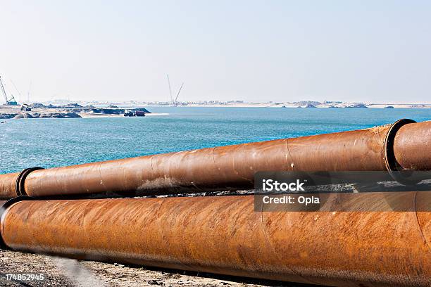 Photo libre de droit de Pipeline Avec Deuxième Maasvlakte banque d'images et plus d'images libres de droit de Maasvlakte - Maasvlakte, Culture néerlandaise, Eau