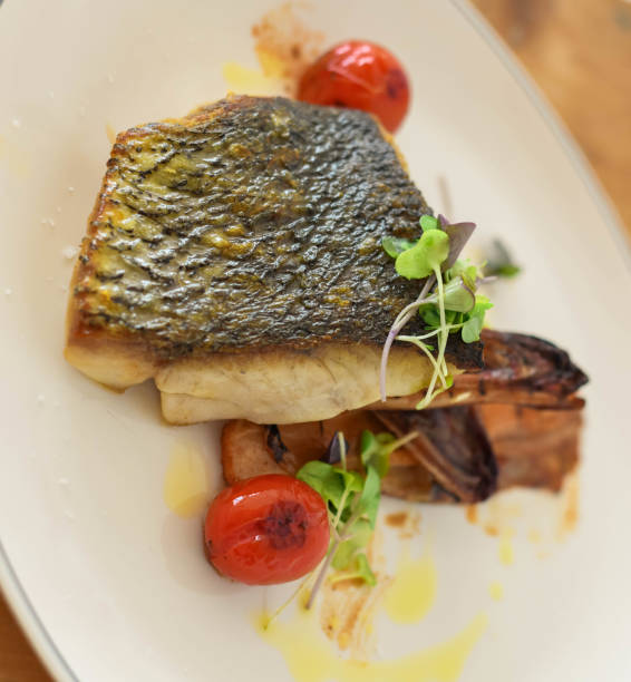 istock Sea bass with grilled kimchi 1748539942