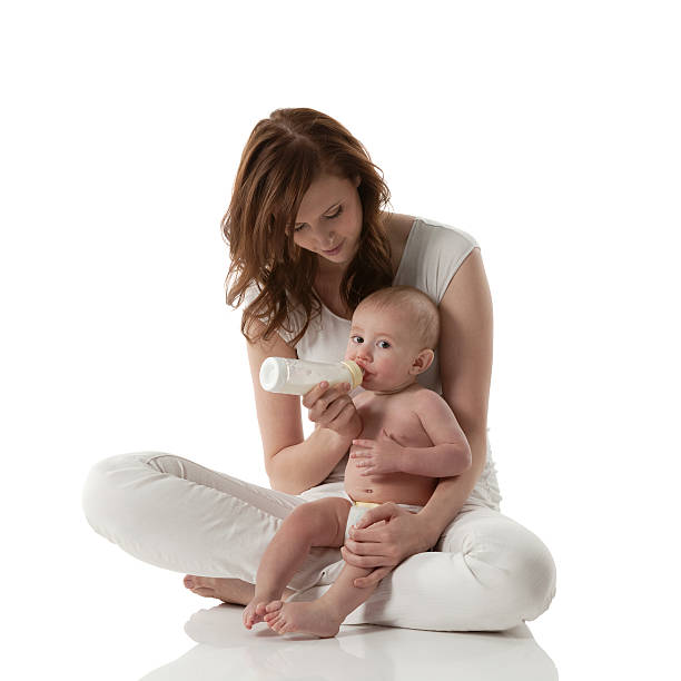 istock Mother feeding her baby 174854183