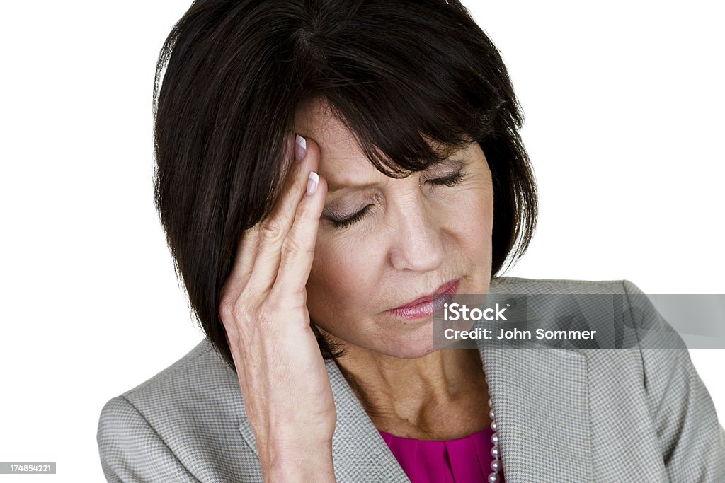 Empresaria con migraña dolor de cabeza - Foto de stock de 50-54 años libre de derechos