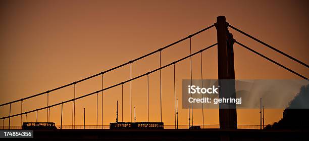 Traffic On The Road And Bridge At Sunrise Stock Photo - Download Image Now - Bridge - Built Structure, Budapest, Built Structure