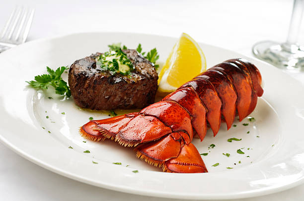 mare e monti - lobster steak lobster tail main course foto e immagini stock