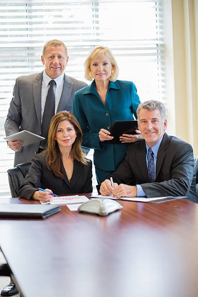 istock Business People At Conference Table 174855032