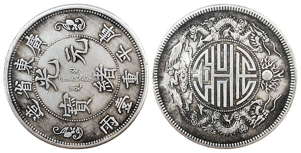 Old chinese coin on white background Old chinese coin isolated on white chinese yuan coin stock pictures, royalty-free photos & images