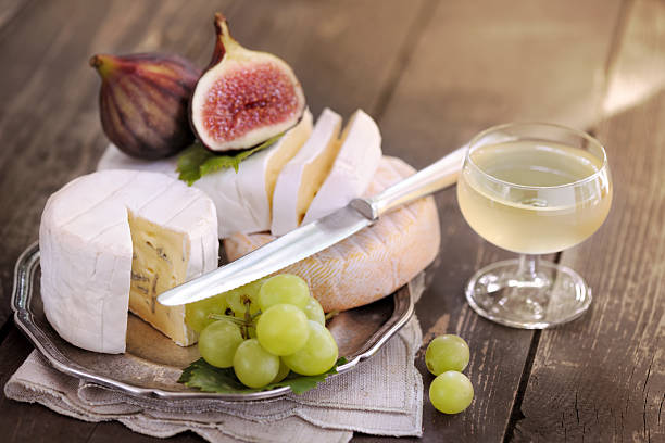 Cheese Plate Cheese Plate - selective focus plate fig blue cheese cheese stock pictures, royalty-free photos & images