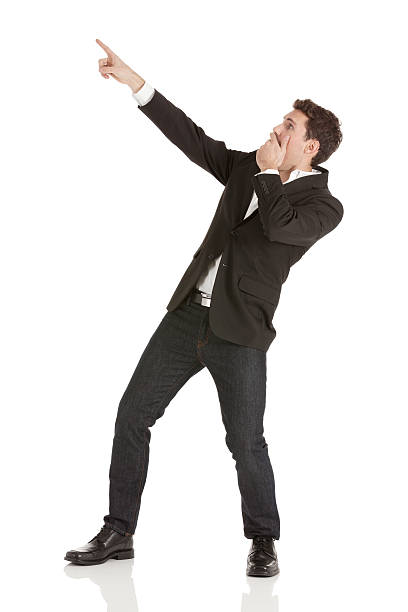 istock Surprised businessman pointing away from finger 174855283