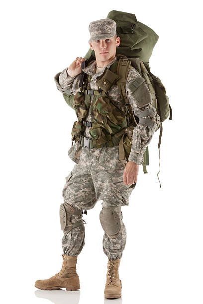 istock Serious army soldier carrying his luggage 174856273