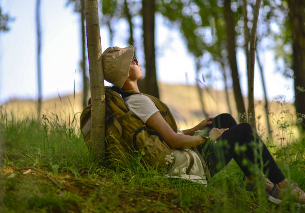 istock young female mountaineer camping 1748571644