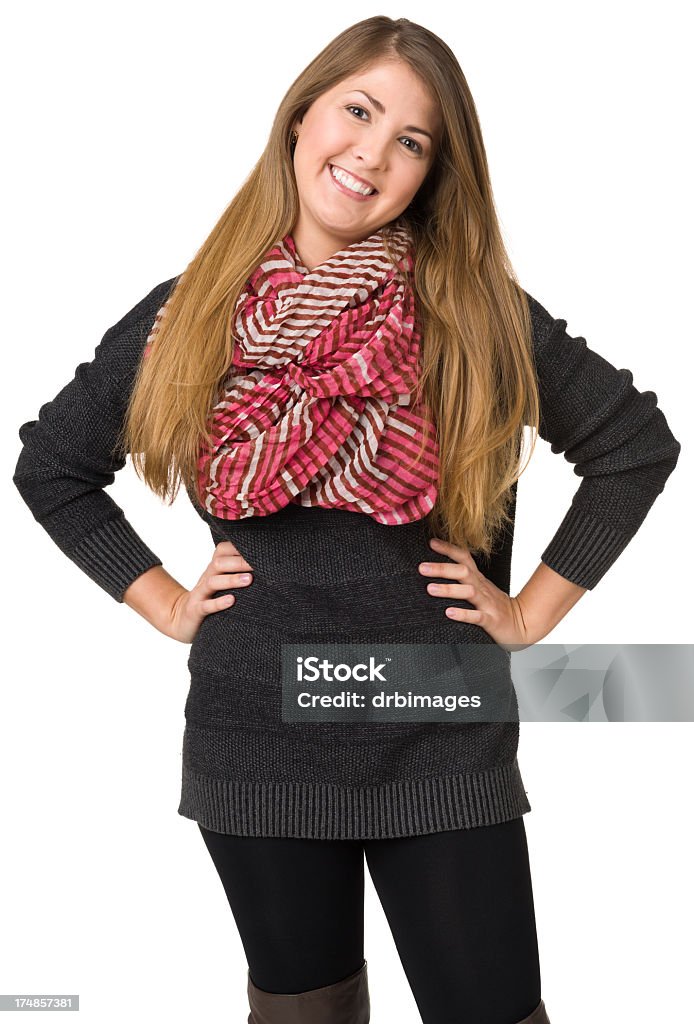 Happy Young Woman With Hands On Hips Portrait of a young woman on a white background. 18-19 Years Stock Photo