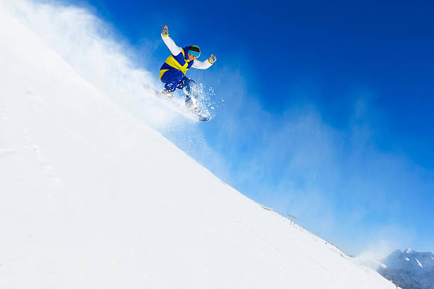 istock Freestyle snowboarder in a jump 174857693