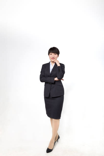 istock Bussiness woman stooding before white background 1748583483