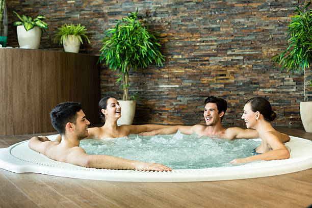 istock Friends having fun in hot tub 174858399