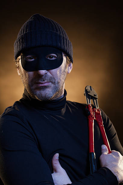 istock Portrait of Thief with Nippers 174858437