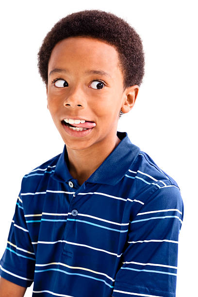 istock Elementary age 9-10 year old African Descent boy making faces 174858591