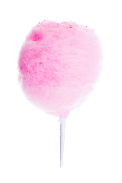 Pink Cotton Candy Stock photo of some pink cotton candy isolated on a white background. candyfloss stock pictures, royalty-free photos & images