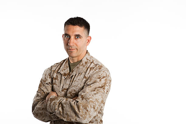 Smiling Marine Marine smiling in his cammies. Is he amused or mad crew cut stock pictures, royalty-free photos & images