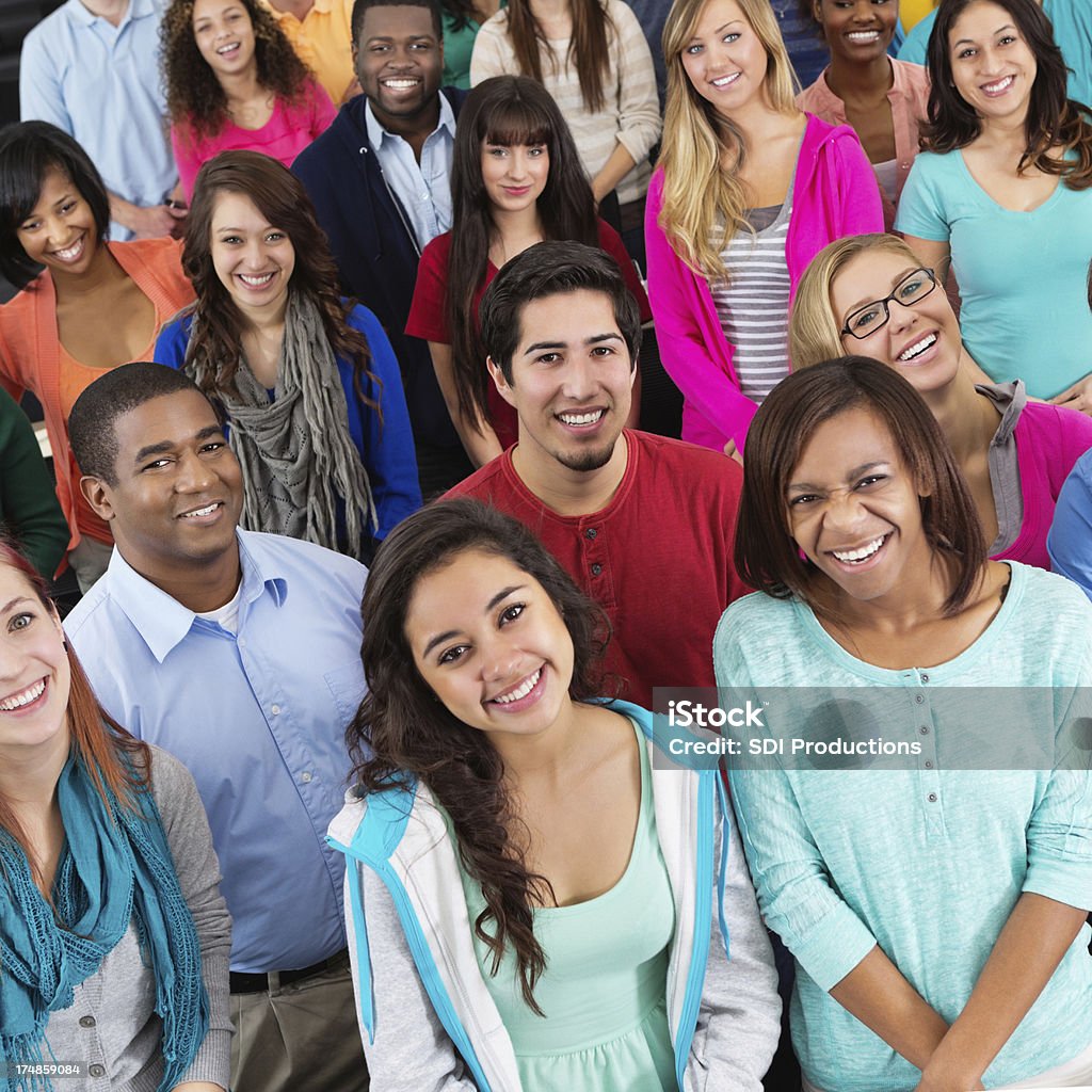 Diverse crowd of college aged students at school event University Student Stock Photo