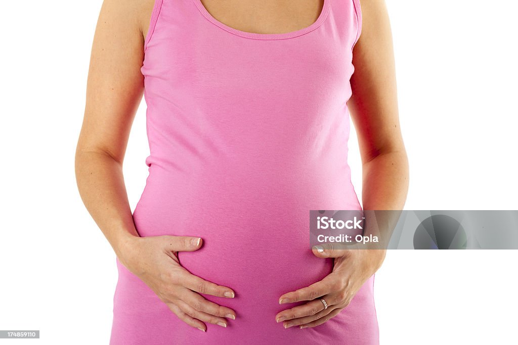 Jeune femme enceinte - Photo de 20-24 ans libre de droits