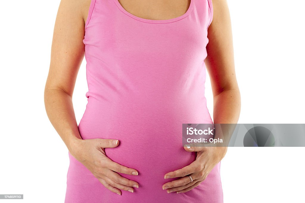 Молодая беременная женщина, - Стоковые фото 20-24 года роялти-фри