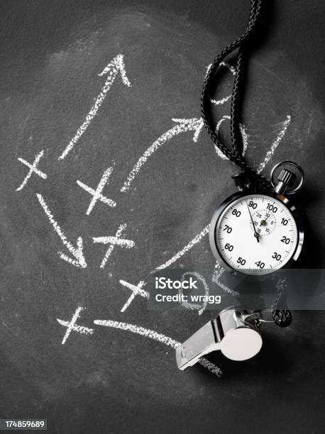 Arrows With Crosses On The Blackboard A Whistle And Stopwatch Stock Photo - Download Image Now