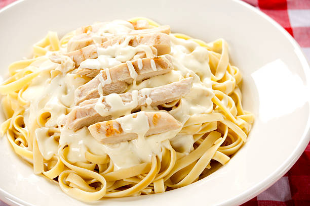 istock Chicken Fettuccine Alfredo with white wine 174860669