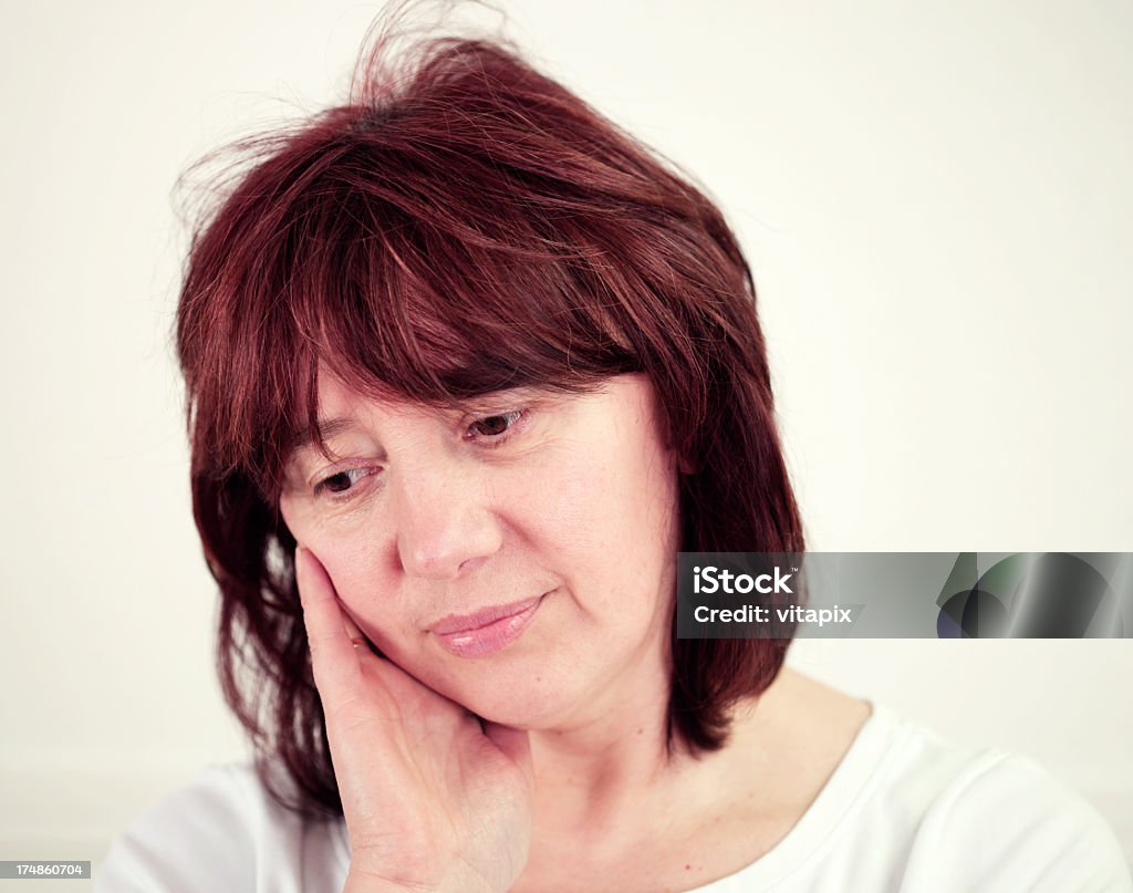 Preoccupato donna matura - Foto stock royalty-free di 45-49 anni