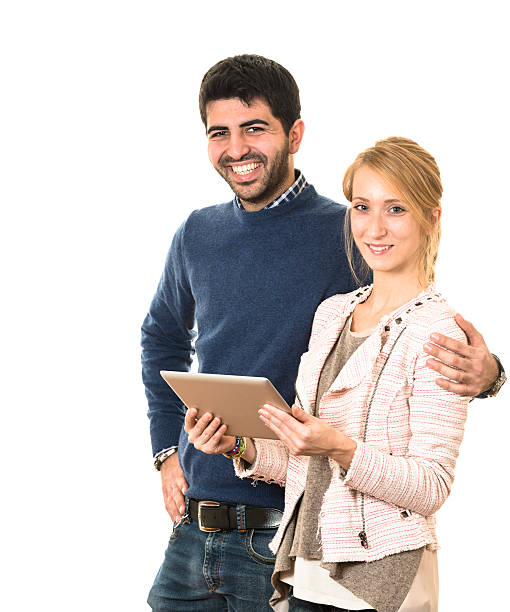 istock couple showing his tablet 174861218