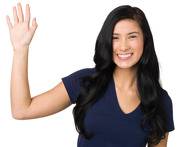 счастливый молодая женщина, размахивающий лапами рука hello - waving separation hello student стоковые фото и изображения