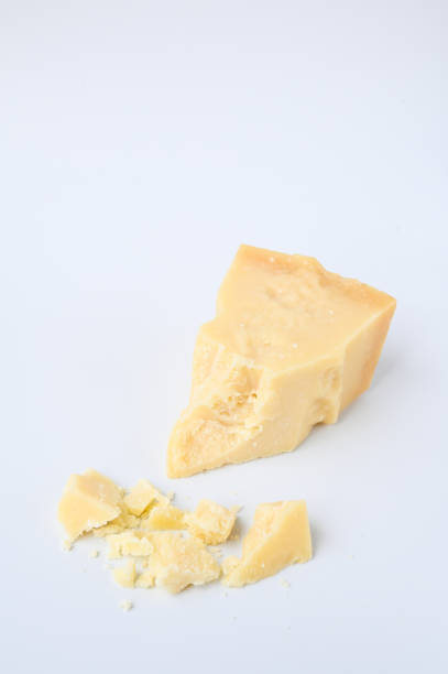 istock delicious parmesan cheese on white background. 1748613554