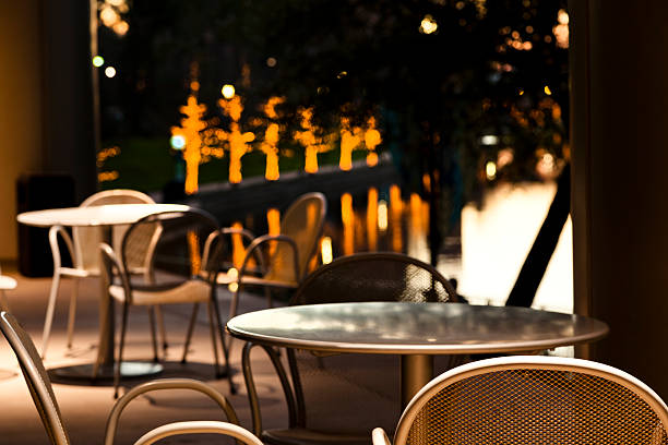 istock Cafe seating with tranquil water and trees in background 174861522
