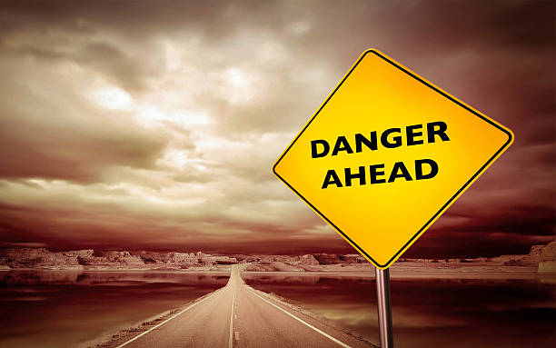 istock Danger Ahead sign on open road, conceptual 174861771
