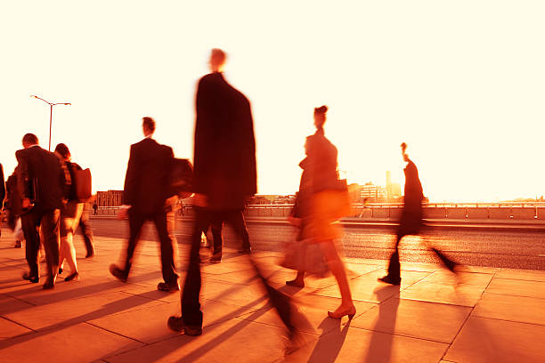 istock Business Commuters Walking at Sunset, Blurred Motion, London, UK 174861845