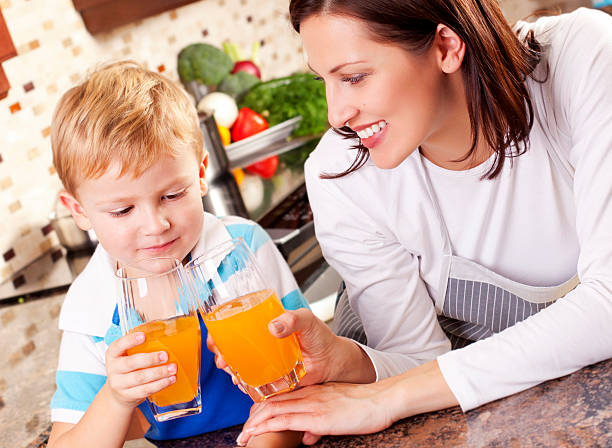 istock Mother and Son in the Kitchen 174861910