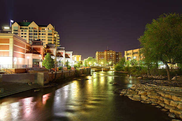 Reno Reno Nevada skyline on the Truckee River at night. Reno is a city in the US state of Nevada near Lake Tahoe. Known as "The Biggest Little City in the World", Reno is famous for its casinos. Reno is also known  for its glitz, glamour, and a variety of recreation activities  truckee river photos stock pictures, royalty-free photos & images