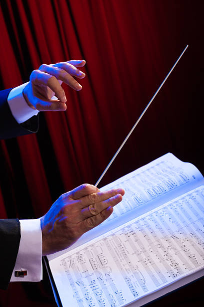 istock Music conductor holding a baton 174862124