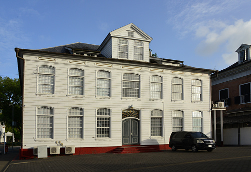 Paramaribo, Suriname: Huis Du Plessis, named after 18th century plantation owner Maria Susanna du Plessis - office of the first lady, formerly the Ministry of the Interior (Min BiZa) - colonial stately house completed in about 1740, entrance in Louis XIV style - Independence Square - Historic Inner City of Paramaribo, Unesco World Heritage Site.