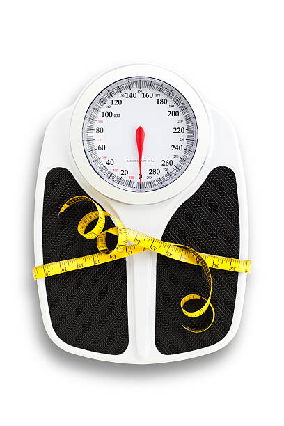 istock Weight Scale and Tape Measure, Dieting Concepts. 174862260