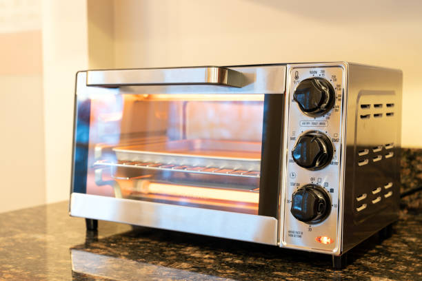 istock Stainless steel toaster oven in the kitchen countertop 1748623689
