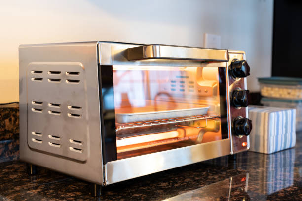 istock Stainless steel toaster oven in the kitchen countertop 1748623840