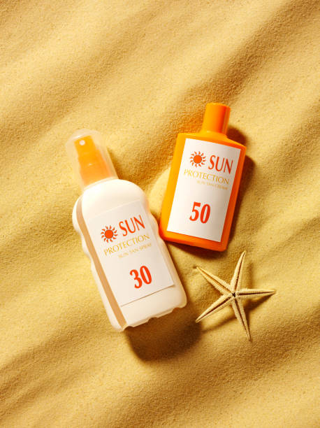 istock Sun Cream and Starfish in the Sand 174862458