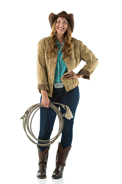 Smiling cowgirl with a lasso