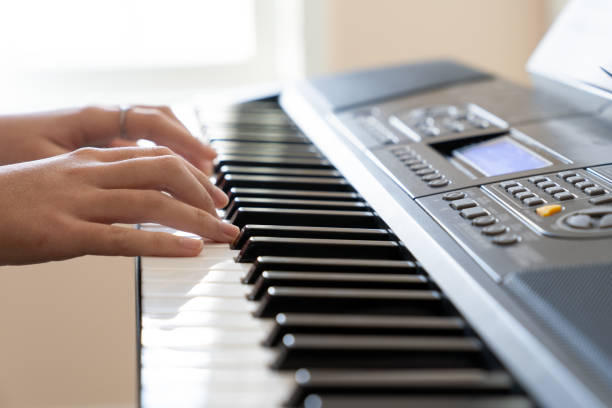istock Hands of musician playing keyboard 1748625880