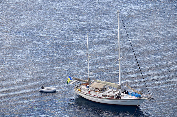 istock sailing ship afloat in calm waters 174862648