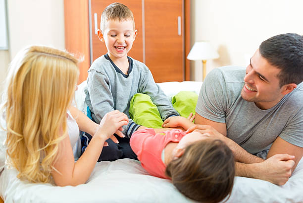 istock Family playing Together In Bed 174862742
