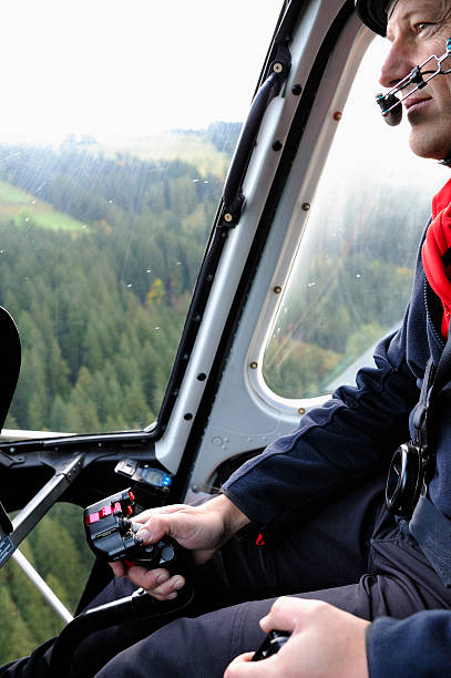 istock Pilot in Cockpit of a Modern Helicopter 174863044