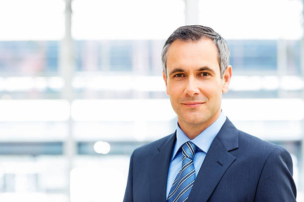 istock Smiling businessman wearing a suit 174863101