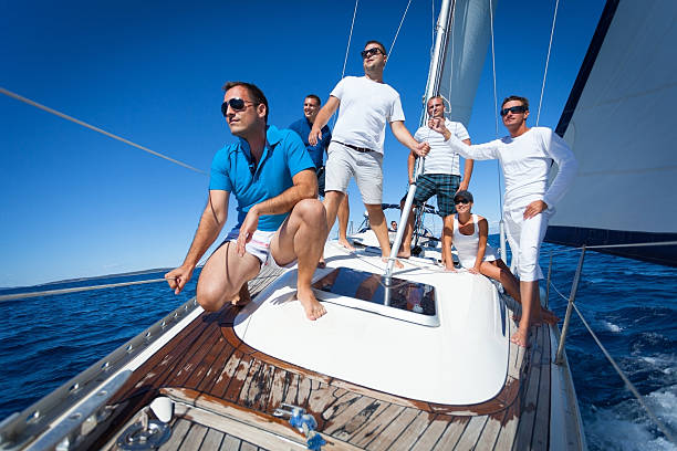 istock Group od friends posing on the sailboat 174863169