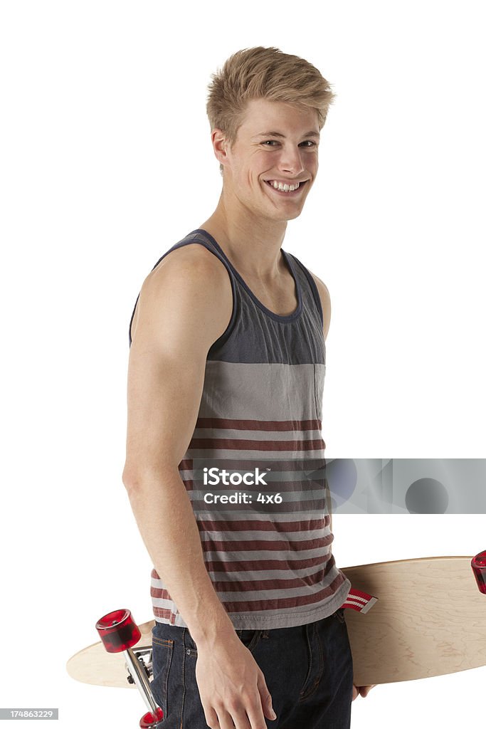 幸せな若い男性、ロングボード - �スケートボードのロイヤリティフリーストックフォト
