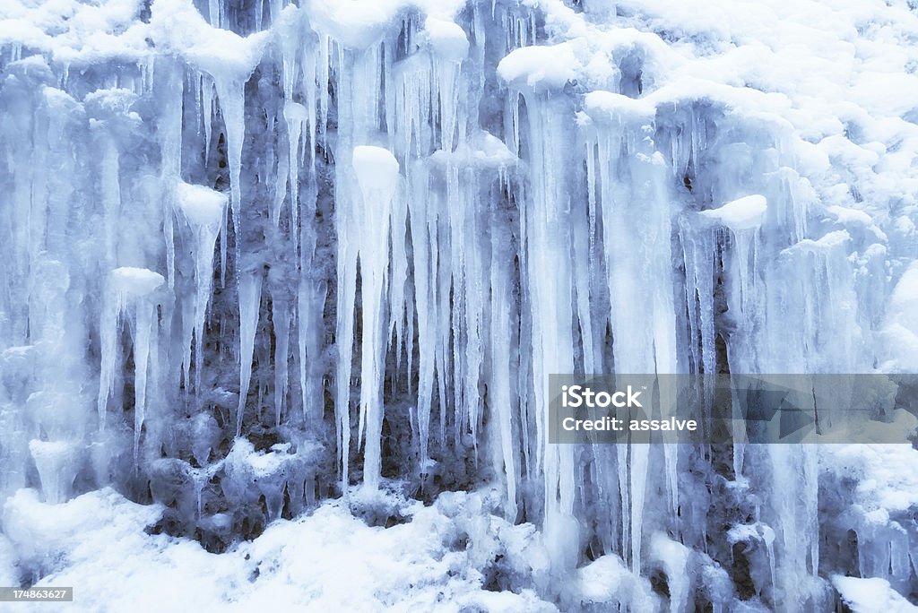 huge ice wall full of icicles Icicle Stock Photo